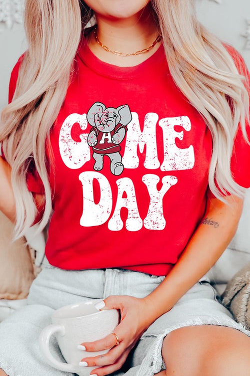 Game Day graphic short-sleeve T-shirt with printed lettering, shown worn by a model