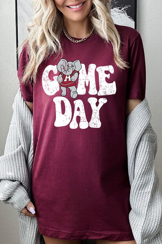Game Day graphic short-sleeve T-shirt with printed lettering, shown worn by a model