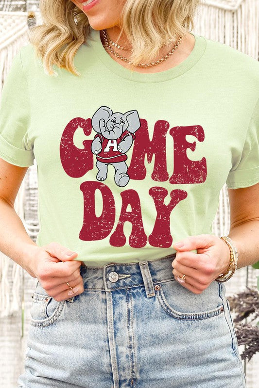 Game Day graphic short-sleeve T-shirt with printed lettering, shown worn by a model
