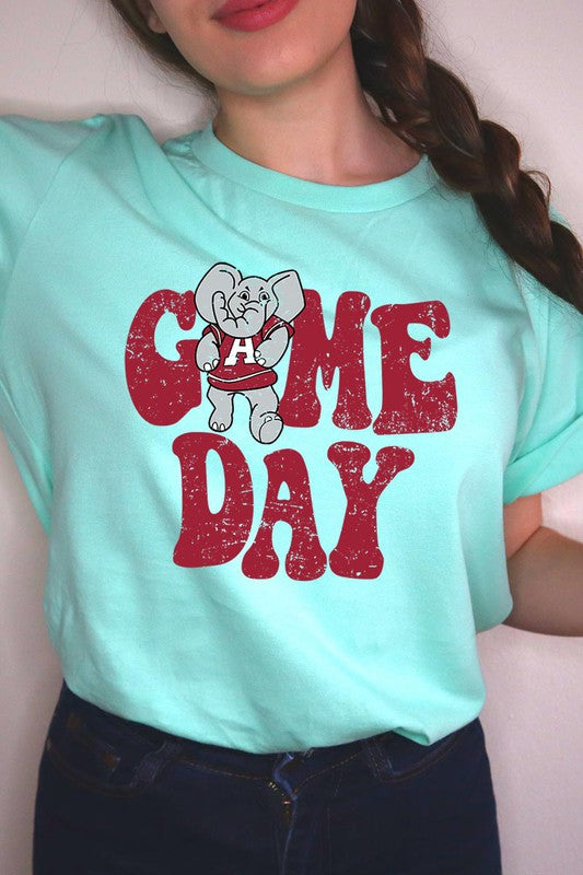 Game Day graphic short-sleeve T-shirt with printed lettering, shown worn by a model