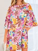Front view of the floral swing mini dress showing bell sleeves and a side pocket