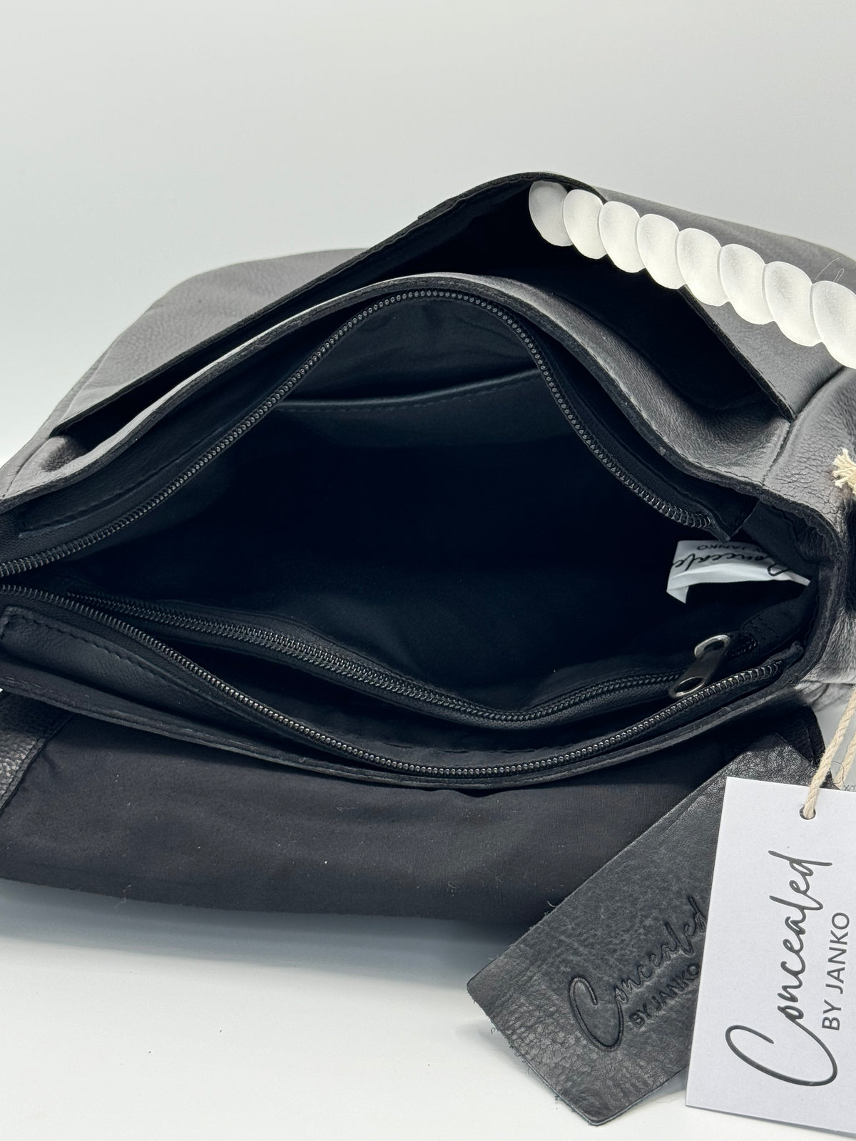 Concealed By Janko Hobo Style Flap Over Front