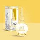 Bougie de Paris Eiffel Tower-shaped perfume, smells amazing and comes in a pretty yellow package with a   bright yellow background