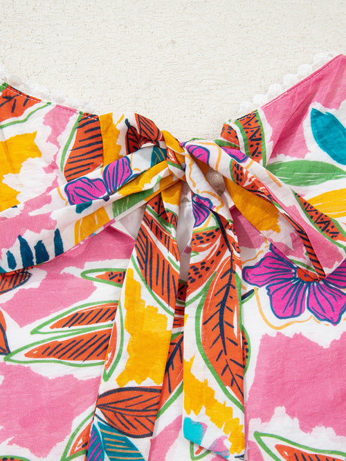 Detail of the floral dress fabric tie at the back neckline