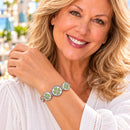 Sandy Snap Four Leaf Clover Crystal 18mm Charm worn on a model with interchangeable snap styling; additional pieces shown for styling