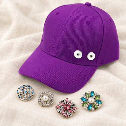 Multicolor Sandy Snap Interchangeable Charm Baseball Caps plain base beside four separate decorative snaps; styling choices