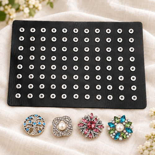 Leather Sandy Snap Interchangeable Charm Holder/Display Mat plain base beside four separate decorative snaps; styling choices