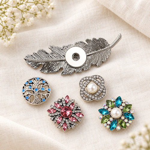 Silver Feather Sandy Snap Interchangeable Charm Hair Clip/Barrette plain base beside four separate decorative snaps; styling choices