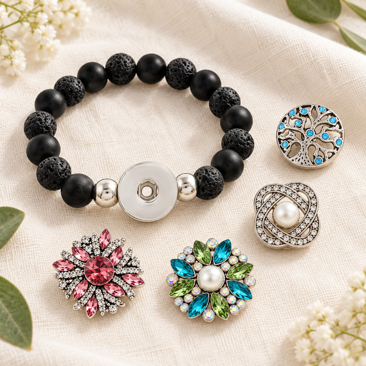 Aromatherapy Black Lava Rock Sandy Snap Interchangeable Charm Bracelet plain base beside four separate decorative snaps; styling choices