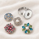 Stainless Steel Sandy Snap Interchangeable Charm Ring plain base beside four separate decorative snaps; styling choices