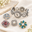 Stretchable 4 Charm Sandy Snap Interchangeable Charm Bracelet plain base beside four separate decorative snaps; styling choices