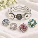 Stretchable 4 Charm Sandy Snap Interchangeable Charm Bracelet plain base beside four separate decorative snaps; styling choices