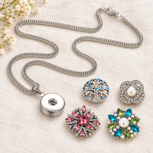 Stainless Steel Pendant Sandy Snap Interchangeable Charm Necklace plain base beside four separate decorative snaps; styling choices