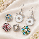 Sandy Snap Interchangeable Charm Earrings Drop Pendant Style plain base beside four separate decorative snaps; styling choices