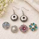 Round Artistic Sandy Snap Interchangeable Charm Earrings 12mm plain base beside four separate decorative snaps; styling choices