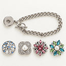 Silver Snap Charm Bracelet plain base beside four separate decorative snaps; styling choices