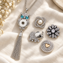 Empty owl tassels necklace beside four snap choices