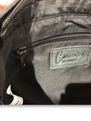 Conceal and Carry Handbag. The Abigail #654 is small yet large enough to carry. Soft Stavenger Leather is soft and subtle yet sturdy.
