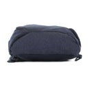 Bottom view of the navy Jessie & James Peyton sling backpack