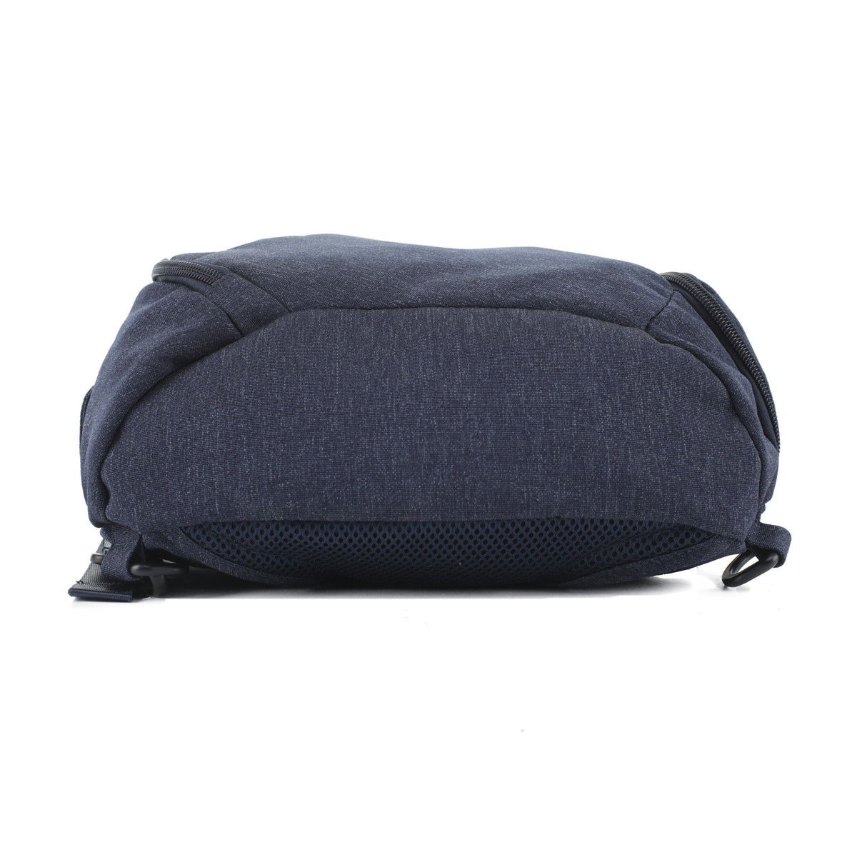 Bottom view of the navy Jessie & James Peyton sling backpack