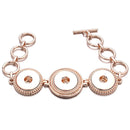 Rose-gold-tone three-snap bracelet with linked rings and toggle closure